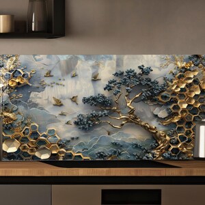 May include: A rectangular wall art piece depicting a stylized tree with blue leaves and gold detailing. The artwork features a backdrop of blue skies and flying birds, with gold honeycomb-like structures. The piece is displayed on a kitchen work surface.