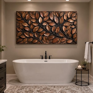 Può includere: Un'opera d'arte murale rettangolare con una scultura in rilievo di foglie color rame su rami scuri, montata sopra una vasca da bagno bianca freestanding in un bagno con mobili scuri e una cabina doccia in vetro.