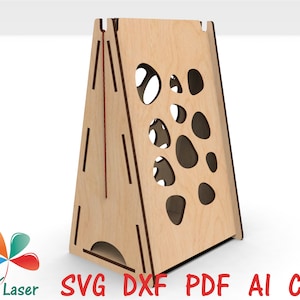 May include: A wooden, triangular-shaped, freestanding structure with a series of round cutouts on one side. The structure is made of light brown wood and has a red string running through it.