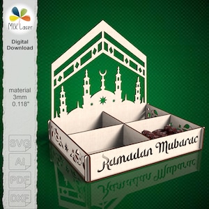 May include: A laser-cut wooden Ramadan Mubarak serving tray. The tray features a mosque silhouette design with a crescent moon and star. The tray is divided into four compartments and contains dates. The text "Ramadan Mubarak" is displayed on the front.