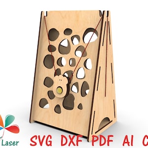 May include: Wooden toy with a maze of holes and a hanging bear-shaped object. The toy is made of light brown wood and has a red string attached to the bear.