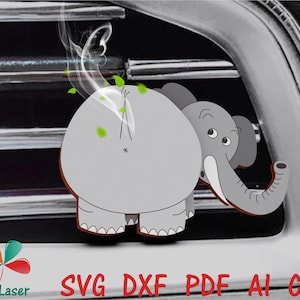 May include: A gray cartoon elephant with a trunk and large ears is sticking out of a car's air vent. The elephant is emitting smoke and green leaves, suggesting it is a car air freshener.