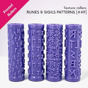 May include: Four purple cylindrical texture rollers featuring raised patterns of runes and sigils. The text on the image reads Printed Rollers, texture rollers, RUNES & SIGILS PATTERNS [#49]. Each roller has a distinct embossed design.