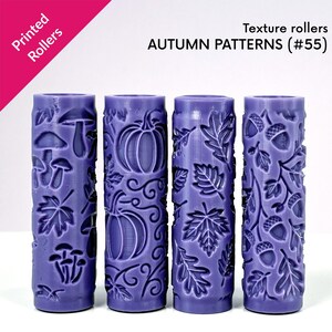 May include: Four purple texture rollers with autumn patterns. Designs include mushrooms, pumpkins, leaves, and acorns. The text on the image reads "Printed Rollers" and "Autumn Patterns (#55)".
