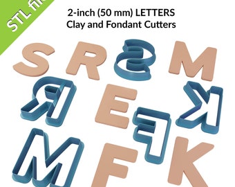 May include: A set of 2-inch (50 mm) alphabet cookie cutters in brown and blue. The letters are S, R, &, M, Я, E, F, K.  STL files.