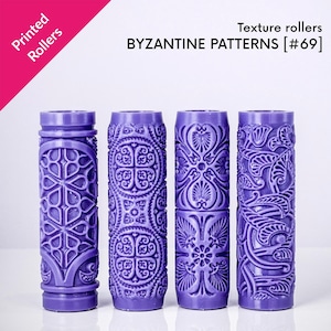 May include: Four purple texture rollers with Byzantine patterns. Each roller features a unique embossed design, including geometric shapes and floral motifs. The text "Printed Rollers" and "BYZANTINE PATTERNS [#69]" are visible.