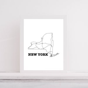 May include: A black and white line art print of the state of New York with the text "NEW YORK" below the map.