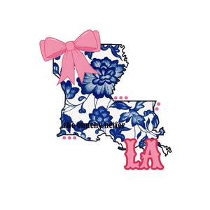 May include: A blue and white floral design of the state of Louisiana with a pink bow on top and the text "LA" in pink at the bottom.
