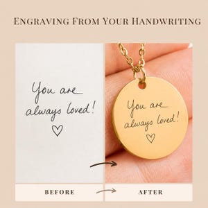 May include: A gold-toned circular pendant necklace featuring the engraved text 'You are always loved!' and a small heart symbol, matching the handwritten script shown on a white paper sample labeled before and after the engraving process.