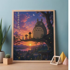 May include: A framed print featuring a scene from the animated film, "My Neighbor Totoro." The artwork depicts Totoro sitting on a tree branch with two children, set against a sunset sky. The Japanese text "となりのトトロ" is visible.