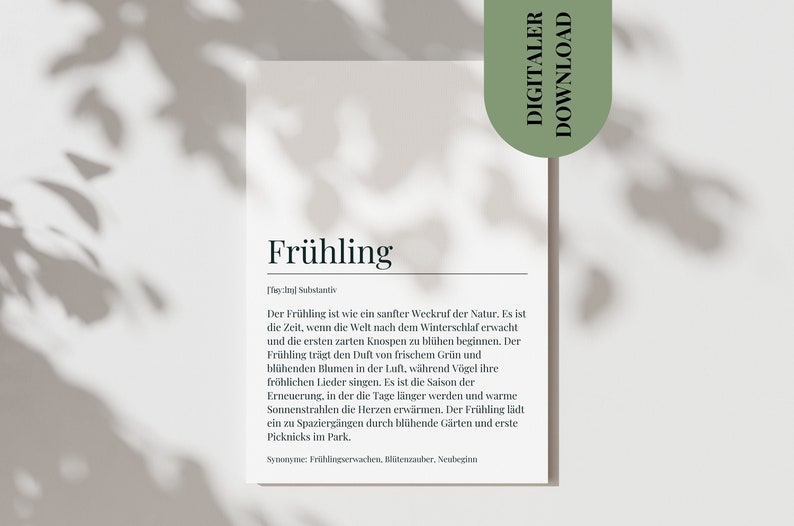 May include: A printable definition card for the word "Fr&uuml;hling" (German for "Spring"). The card features a black and white text design on a white background. The text describes Spring as a gentle awakening of nature, with blooming flowers, birds singing, and longer days.