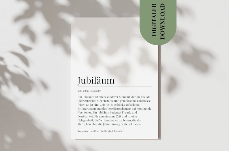 May include: A printable definition of the word "Jubil&auml;um" in German, meaning "anniversary". The definition explains that a jubilee is a special moment to celebrate milestones and shared experiences. The text is in black on a white background.