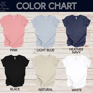 K&ouml;nnte beinhalten: Farbkarte mit sechs verschiedenen T-Shirt-Farben: Pink, Hellblau, Heather Navy, Schwarz, Natur und Wei&szlig;.