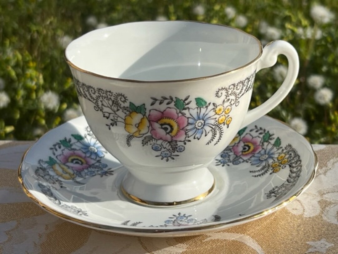Vintage Clarence Bone China Two Piece Teacup & Saucer Floral Design