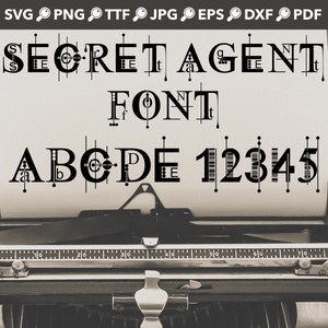 May include: Black and white image of a vintage typewriter with a sheet of paper in it. The paper has the text "SECRET AGENT FONT ABCDE 12345" printed on it.