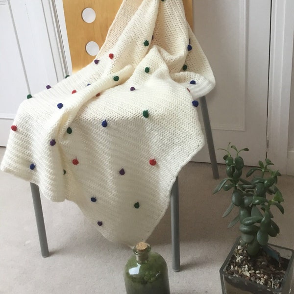 Cream Handmade Crochet Lap Blanket with Multi Coloured Bobble Detail. Made with soft wool, machine washable.