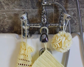 A hand crocheted set of soap holder/bag, washcloth and shower pouf. Skin care. Beauty routine