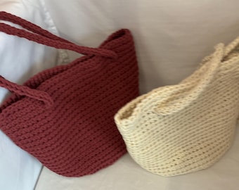 Crochet Dewdrop/Bucket bag, with a hand corded strap. A versatile bag as the strap can be used as a shoulder bag or cross body bag