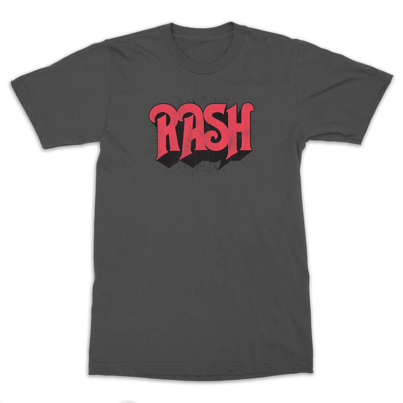May include: A dark gray t-shirt with a red "RASH" graphic in a retro font style.