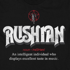 May include: Black t-shirt featuring a white graphic of the word "RUSHIAN" in a vintage font. The word is defined as "An intelligent individual who displays excellent taste in music."