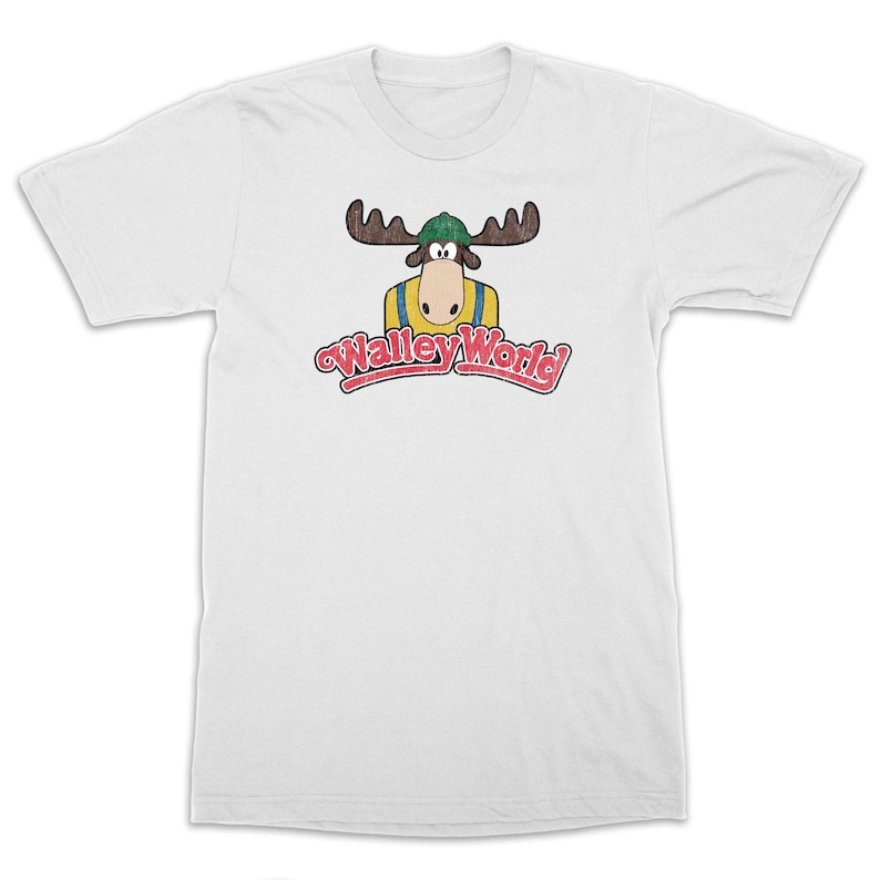 May include: White t-shirt with a vintage-style logo for "Wally World" featuring a cartoon moose wearing a green hat and a yellow shirt.