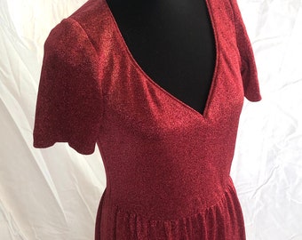 70s red sparkly disco  body skimming midi dress, with deep v neckline, no flaws, pics show it on a size 4/6 dress form. Dress it up or down!