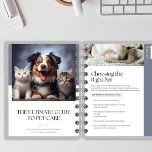 May include: An open notebook with a grey cover and white pages. The cover features a photo of a dog and two cats. The text on the cover reads "The Ultimate Guide to Pet Care" and "Everything You Need to Know to Keep Your Pet Happy and Healthy". The notebook also has a page with the title "Choosing the Right Pet" and a list of benefits of having a pet.