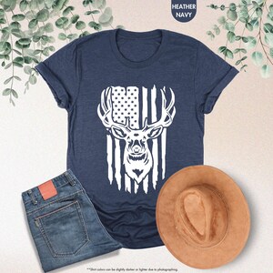 a t - shirt with an american flag and a deer head