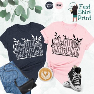 May include: Two t-shirts, one heather navy and one pink, with a white graphic of books and leaves. The books have words like "Loyal," "Ruth," and "Esther." The image also includes jeans, a black purse, a coffee cup, and a pair of black sneakers.