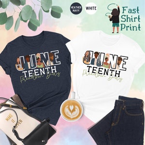 May include: Two t-shirts with the text "Juneteenth Freedom Day" in black letters. The text is surrounded by illustrations of people of different skin tones. One t-shirt is heather navy and the other is white.