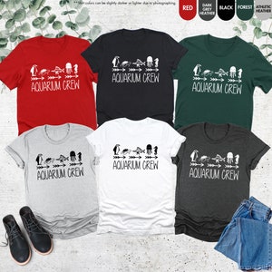 a group of four t - shirts with the words aquarium queen printed on them