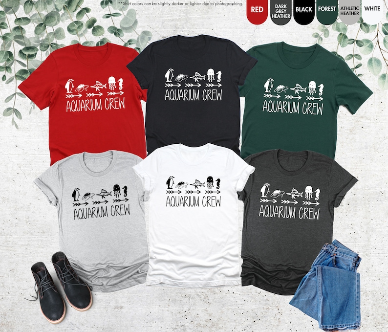 a group of four t - shirts with the words aquarium queen printed on them