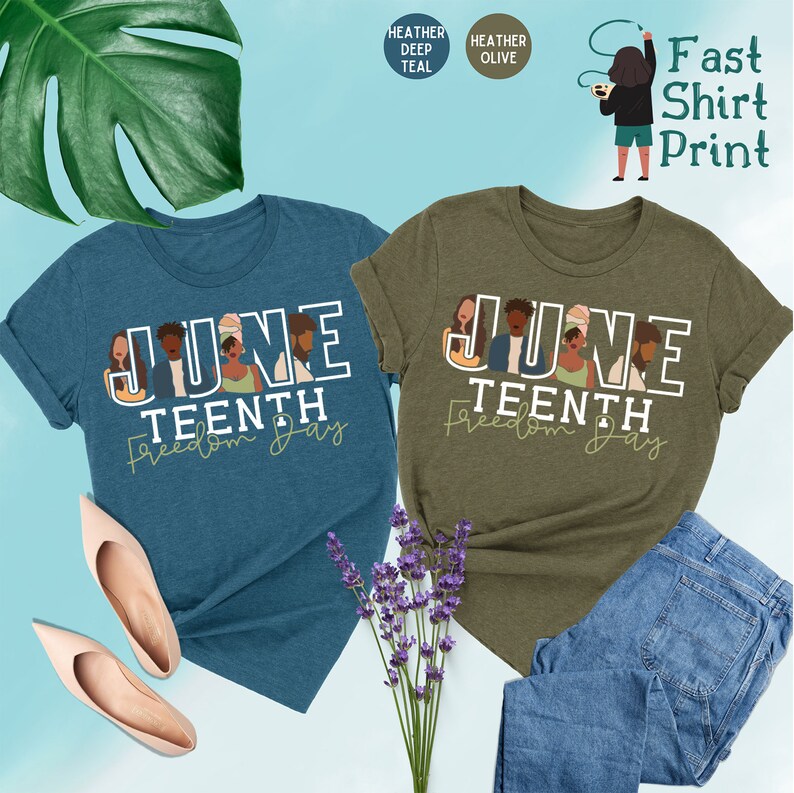 May include: Two t-shirts with the text "Juneteenth Freedom Day" printed on them. The shirts are in heather deep teal and heather olive colors. The text is in white with a green outline. There are illustrations of people in the text.