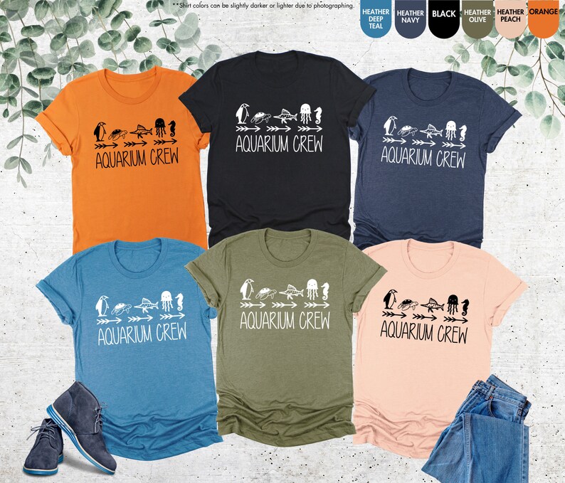 a group of t - shirts that are on a table