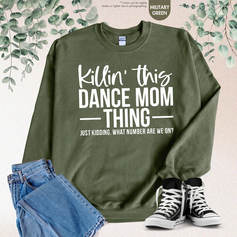 a sweatshirt that says kiln't this dance mom thing with a pair of