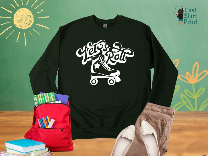 May include: A dark green sweatshirt with white text that says "Let's Roll" and a white roller skate graphic.