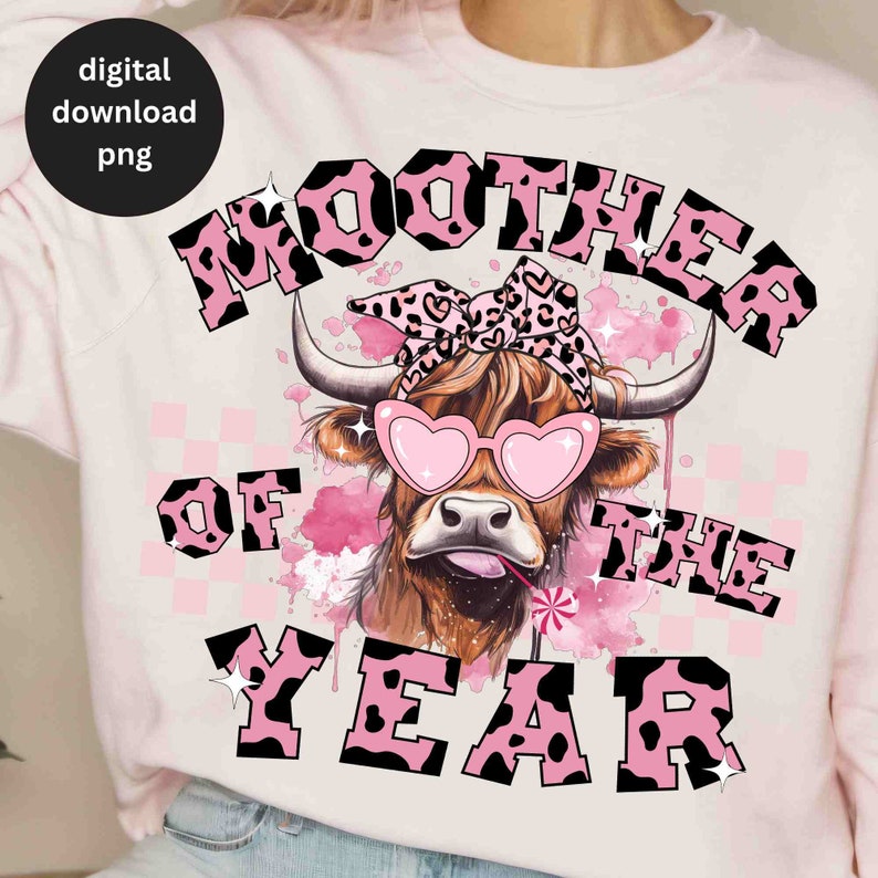 May include: Pink and black graphic design featuring a cow with a pink bandana and heart-shaped sunglasses. The text "MOOTHER OF THE YEAR" is written in a pink and black font.