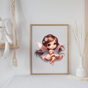 May include: A digital illustration of a fairy with pink wings and a pink dress. The fairy has brown hair and large blue eyes. The illustration is framed in a light wood frame.
