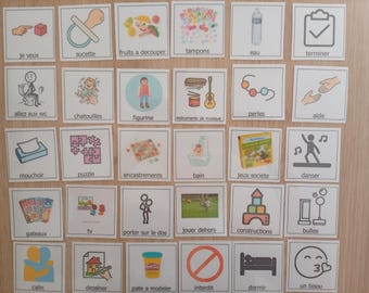 Puede incluir: Una colección de treinta tarjetas de comunicación cuadradas con iconos coloridos y etiquetas de texto en francés. Cada tarjeta muestra una ilustración sencilla que representa actividades, objetos o acciones cotidianas en una cuadrícula.