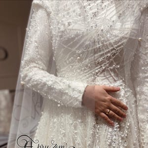 Heavily Beaded Hijab Wedding Dress – Handmade Modest Gown with Train | Custom Long Sleeve Design