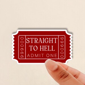 May include: Red ticket with white text that reads "Straight to Hell, Admit One". The ticket has a perforated edge and the numbers 66600000 are printed on either side.