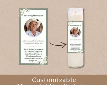 May include: A memorial candle label featuring a sage green border, white floral accents, and a circular photo of a person wearing a cowboy hat. The text reads In Loving Memory of Emmanuel Hernández, 1 December 1960 - 23 June 2025, and a tribute.