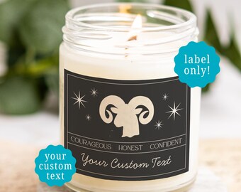 May include: A clear glass candle jar with a lit wick and a black rectangular label. The label features a cream-coloured ram icon, star graphics, and the words COURAGEOUS, HONEST, CONFIDENT, and Your Custom Text. Two teal circular tags read label only! and your custom text.