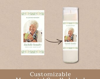 May include: A rectangular memorial candle label featuring a photo of a smiling person holding a green mug, with the text IN LOVING MEMORY, Rachelle Beaudry, and the dates MARCH 12, 2010 - AUGUST 23, 2031, shown applied to a tall white wax candle.