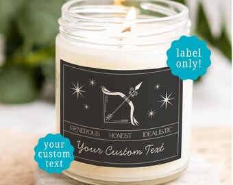 May include: A clear glass jar candle with a white wax fill and a lit wick. The black rectangular label features a white bow and arrow icon, star graphics, and the text GENEROUS, HONEST, IDEALISTIC, and Your Custom Text. A teal badge says label only!