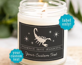 May include: A clear glass jar candle with a white wax fill and a lit wick. The black rectangular label features a white scorpion illustration, star accents, the text PASSIONATE BRAVE RESOURCEFUL, and the placeholder text Your Custom Text.