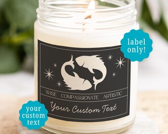 May include: A clear glass jar candle with a white wax fill and a lit wick. The label features a black rectangular background with two white fish silhouettes, star icons, and the text: WISE COMPASSIONATE ARTISTIC and Your Custom Text.