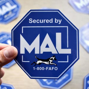May include: A blue and white octagonal sticker with the text "Secured by MAL 1-800-FAFO" and a black silhouette of a dog running.
