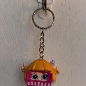 Porte-clés Alice dans la maison