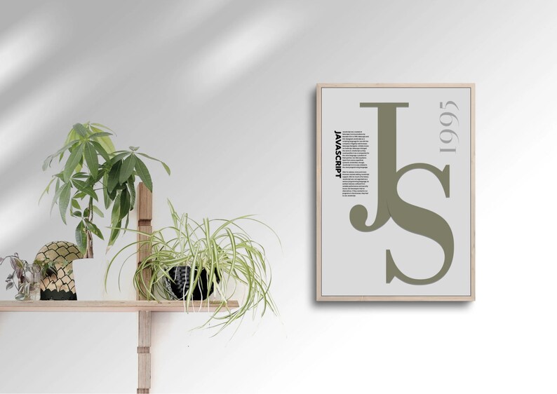 May include: A framed poster featuring the word "JAVASCRIPT" and the letters "JS" in a large, olive green font. The year "1995" is printed vertically. The poster is on a white wall next to a wooden shelf with potted plants.